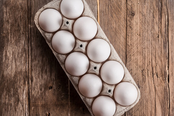 white eggs on a wooden background