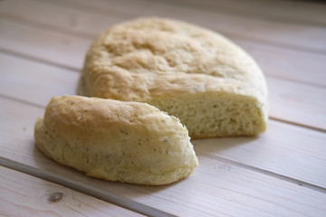 Freshly baked homemade white bread with herbs