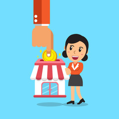 Franchise business concept hand putting coin in store with businesswoman for design.