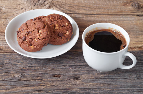 Coffee and cookie with chocolate
