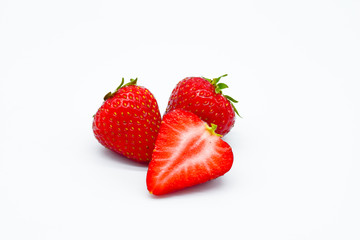 Strawberries cut isolated on white background, strawberry slice