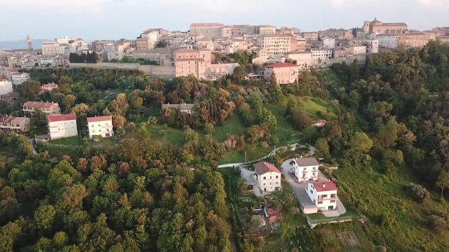 Aerial view of the municipality of Osimo, in the province of Ancona, in the Marche region, in Italy. The historic center with its walls, roofs, squares is a mountain tourist destination.