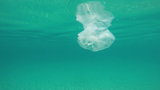 used plastic package in the sea
