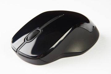 Wireless computer mouse isolated on white background, close-up. Black optical computer mouse.