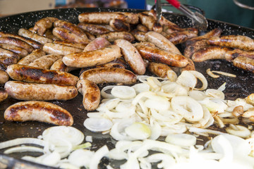 Wild Boar Sausage and Onions on grill
