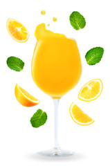 Orange Juice with flying Orange slices and mint leaves