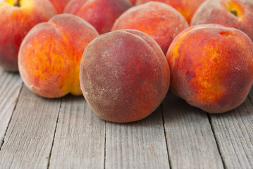 Peaches on wooden