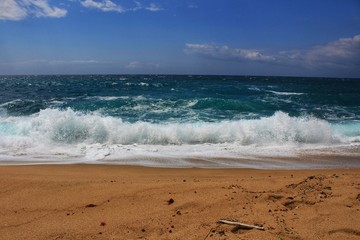 Crystal clear and wild waters in Praia da Foz, Sesimbra, Portugal