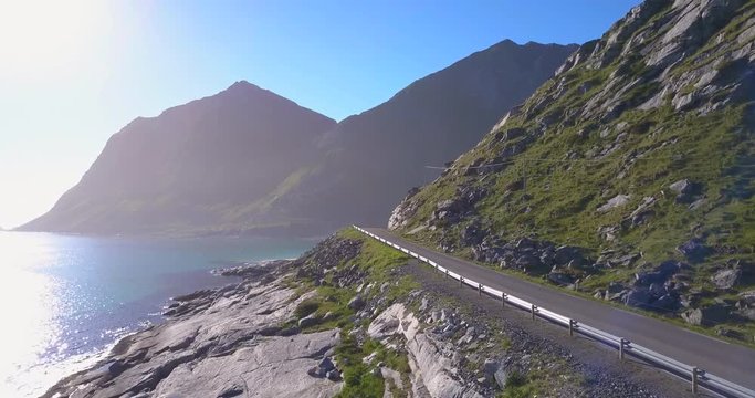 Car Drives Along Beautiful Norwegian Lake