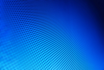 Diagonal blue carbon hole apertures texture background