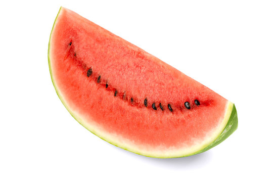 Sweet watermelon slice, front view, on white background. Large ripe fruit of Citrullus lanatus with green striped skin, red pulp and black seeds. Edible, raw and organic. Food photo, closeup.