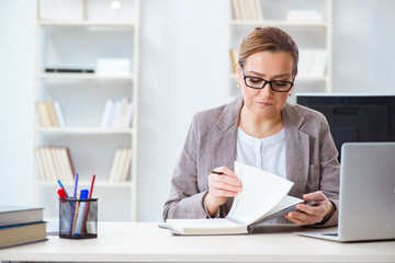 Businesswoman employee working in the office