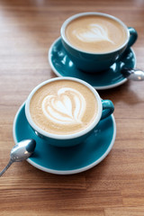 Two cups of coffee on the table