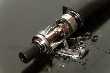 Broken glass in an electric cigarette, broken cigarette