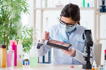 Lab chemist checking beauty and make-up products