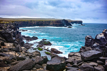 Volcanic rock along the coastline of Suarez Point, Espanola, in the Galapagos Islands