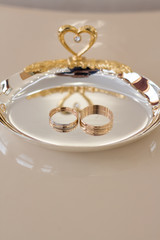 Wedding rings on a plate