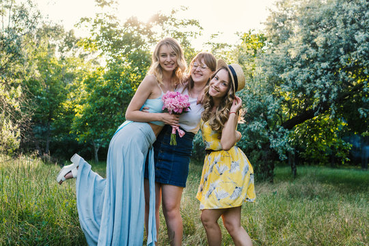 Three girls friends outdoor in the park or forest. bachelorette, party