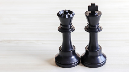 Black queen chessman and black king chessman