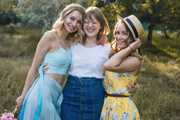 Three girls friends outdoor in the park or forest. bachelorette, party