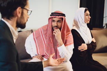 Arab married couple in quarrel at psychologist