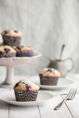Vintage style Photograph of homemade blueberry muffins ready for breakfast 