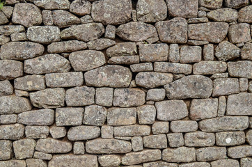 Stone built terracing and buildings at Machu Picchu, an ancient Inca archaeological site near Cusco, Peru