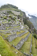 Stone built terracing and buildings at Machu Picchu, an ancient Inca archaeological site near...