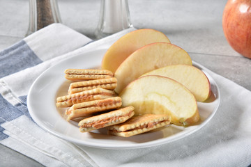 Peanut butter crackers with apple slices