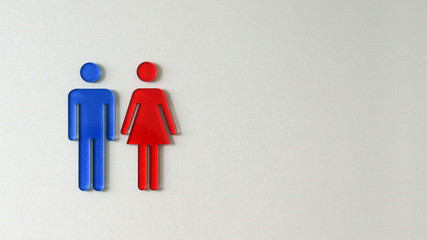 Blue men sign and red women sign.