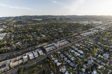 Aerial view of San Fernando Valley 101 freeway and homes in the Encino neighborhood of Los Angeles, California.