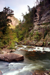 View of the The Tallulah River taken from the Tallulah Gorge located near Clayton Georgia. The gorge is approximately 2 miles long and features rocky cliffs up to 1,000 feet high. 
