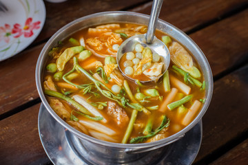 red curry Giant catfish eggs with vegetable in sour soup.