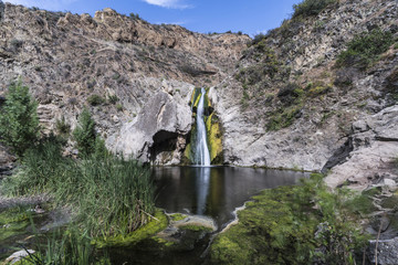 Fototapeta premium Paradise Falls with motion blur water at popular Wildwood Regional Park in Thousand Oaks, California.