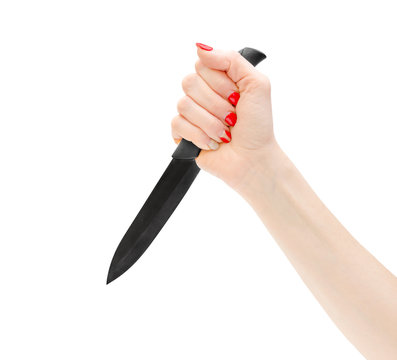Woman hand holding knife. Isolated on white.