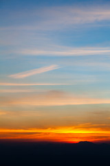 colorful dramatic sky with cloud at sunset.