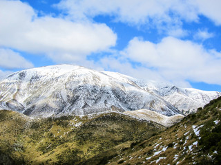 Snow mountains on cloudy day