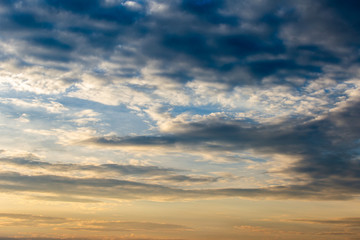 colorful dramatic sky with cloud at sunset.