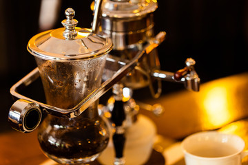 Barista brewing coffee, method pour over, drip coffee.