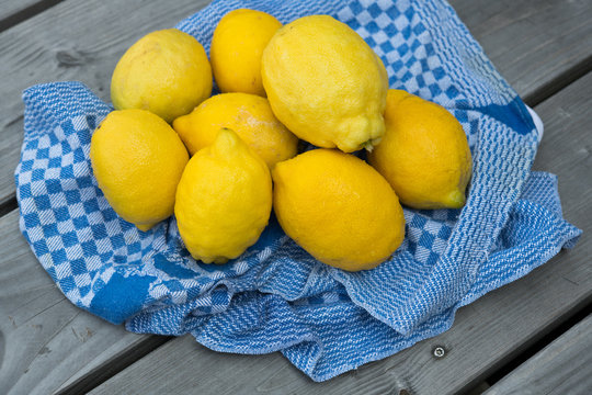 yellow lemons with blue towel