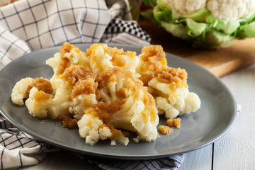 Vegetarian cooked cauliflower with bread crumb