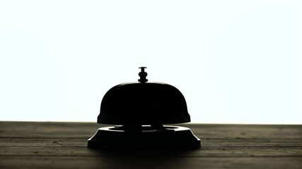 Hand presses the bell at the reception. White background. Silhouette - Powered by Adobe