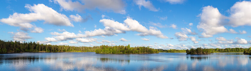 forest lake and sky with clouds