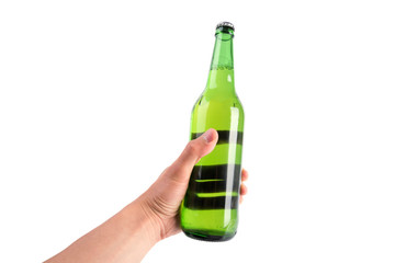 Hand holding up a green beer bottle without label over a white background
