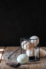raw eggs on a black background
