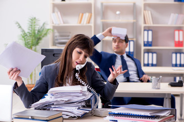 Employee with virtual reality glasses in office