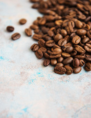 Coffee beans on a stone background