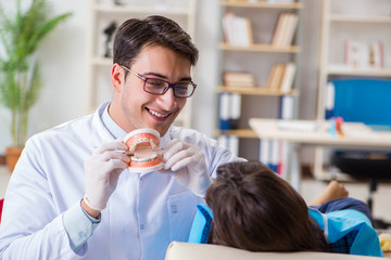 Patient visiting dentist for regular check-up and filling