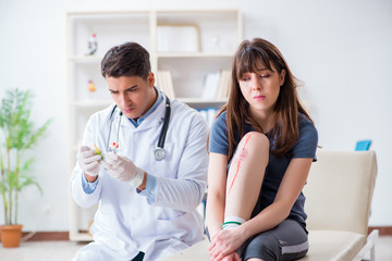 Fototapeta premium Patient visiting doctor after sustaining sports injury