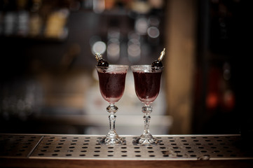 Two elegant glasses filled with sweet and strong Arnaud cocktail